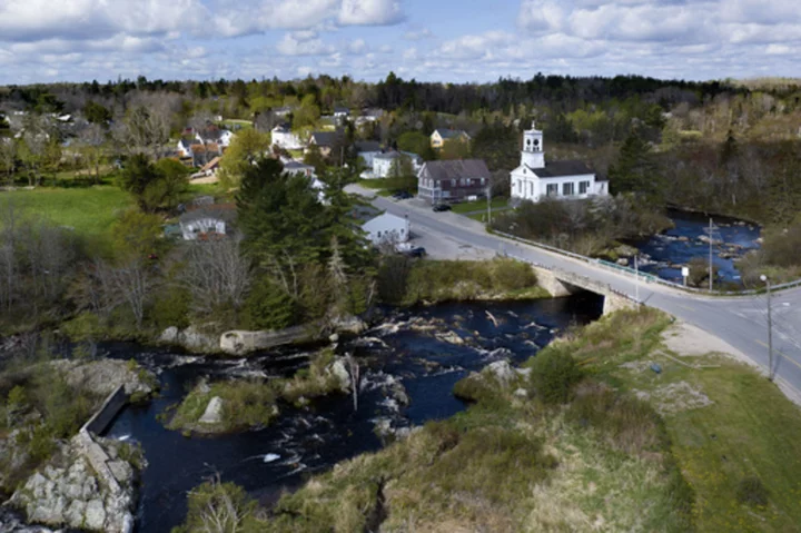 A village in Maine is again delaying a plan to build the world's tallest flagpole