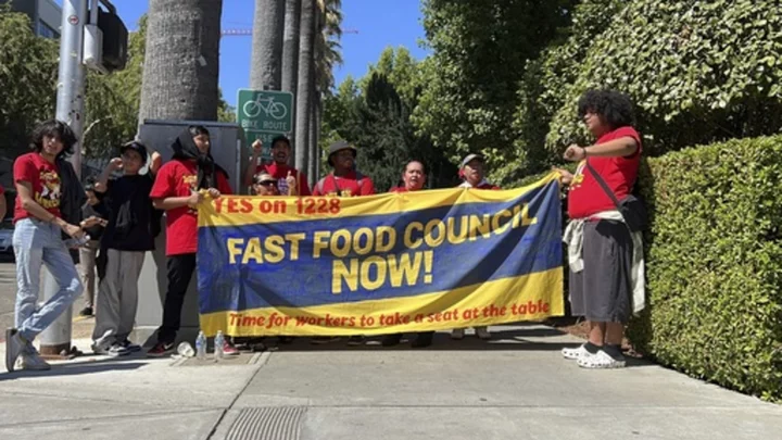 California Gov. Gavin Newsom signs law to raise minimum wage for fast food workers to $20 per hour