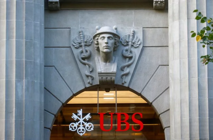 UBS considers delaying results after Credit Suisse rescue - FT