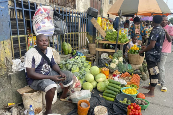 Nigeria's leader presents a $34 billion spending plan that prioritizes the economy and security