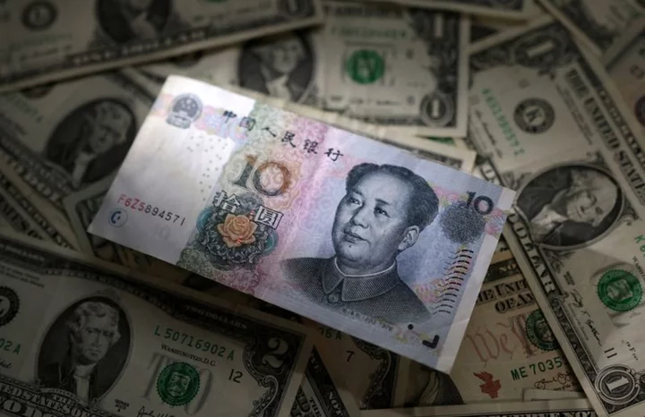 Exclusive-China's state banks seen selling dollars for yuan in London and New York hours