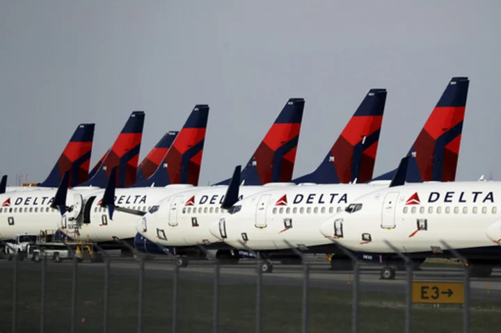 Delta Air Lines scales back changes to its loyalty program after a revolt by customers