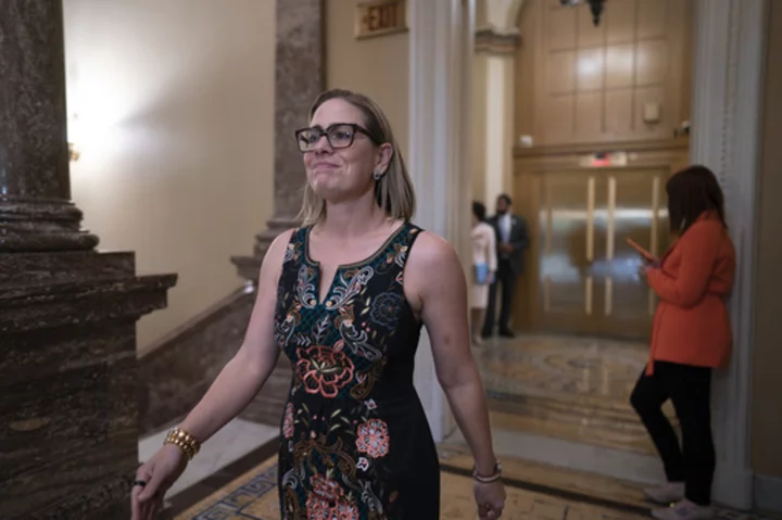 Sinema cites bill targeting leaders of failed banks after criticism of her Wall Street ties