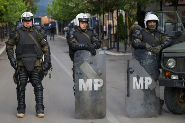 Kosovo Serbs trying to take over municipality building in the north clash with police