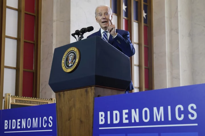 President talks up 'Bidenomics' though new poll shows just 34% approve his handling of the economy