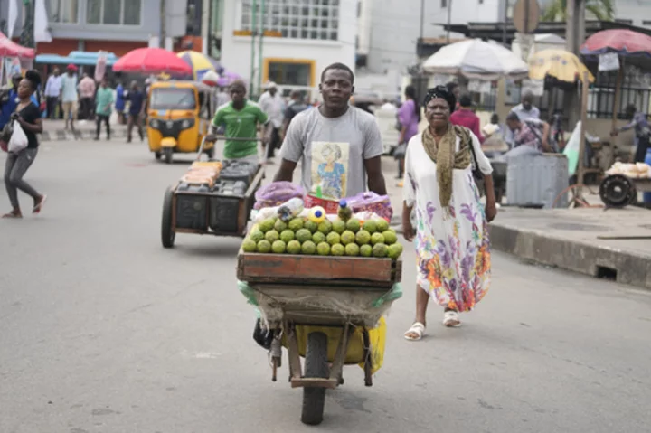 Nigerian workers walk off the job again to protest rising costs after removal of gas subsidies